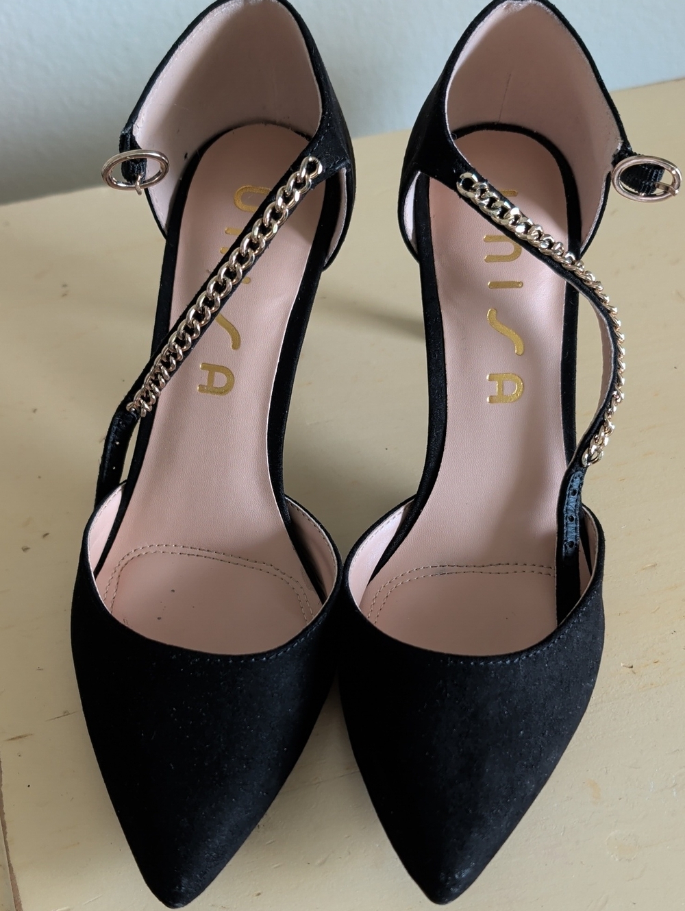 Unisa Black Pointed-Toe Gold Chain Ankle-Strap Pumps